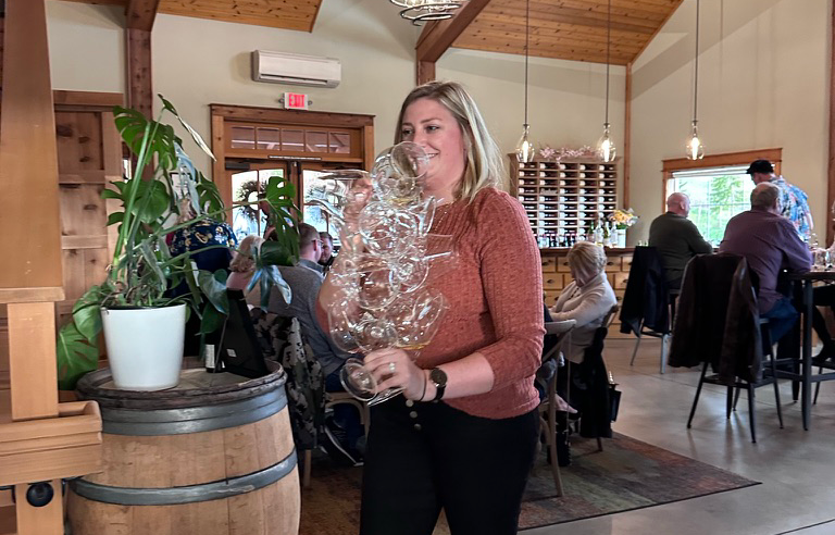 Frustrated tasting room manager with laptop